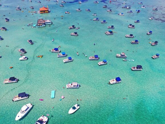 Crab Island Destin Florida. Boats on crystal clear water